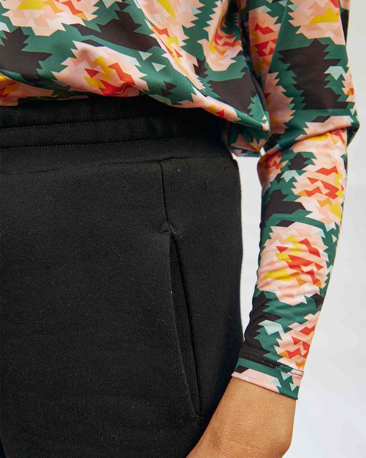 Close up of the pocket detail of the Asmuss Column Joggers in the side seam that is slightly on the front