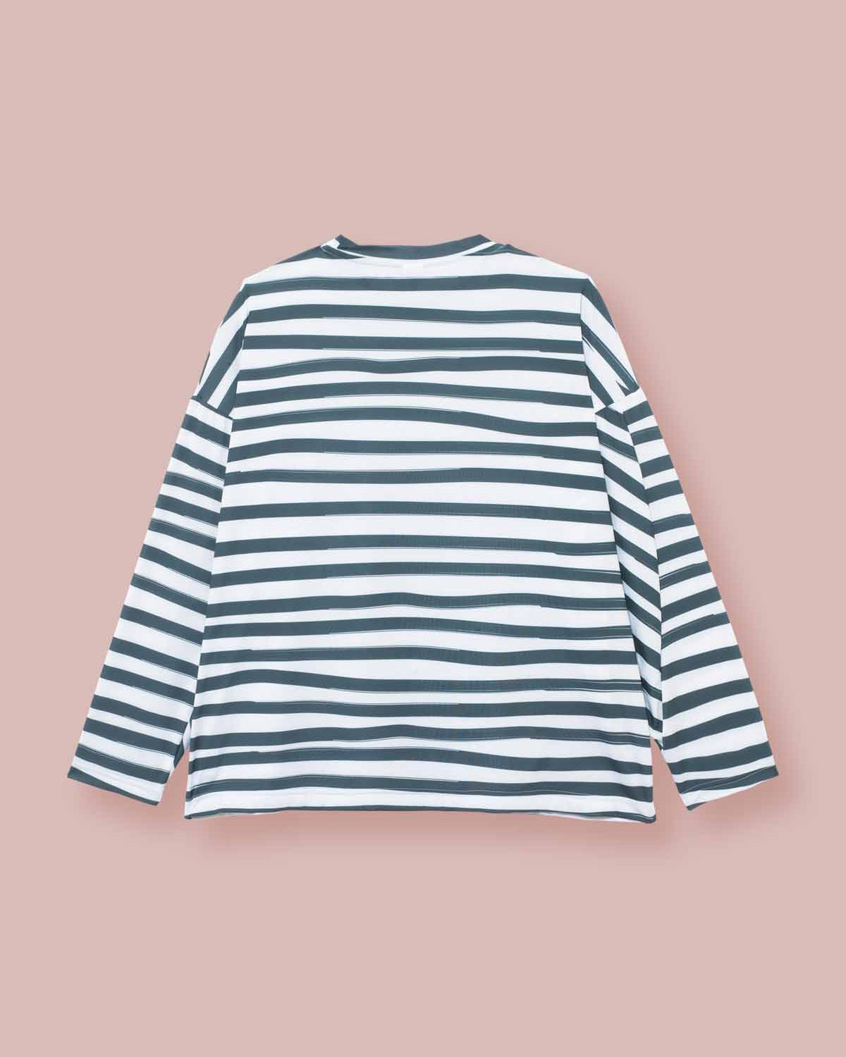 Back view of 3/4 sleeve t-shirt made from a puzzle like pattern with a white background and painterly dark green stripe the Asmuss Zaha Puzzle Top