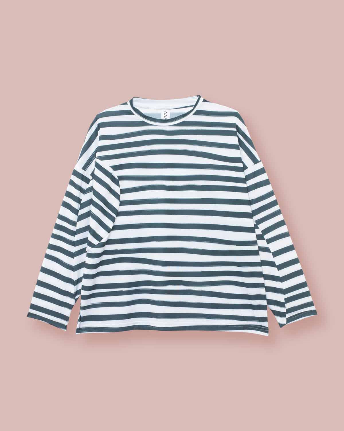 Front view of 3/4 sleeve t-shirt made from a puzzle like pattern with a white background and painterly dark green stripe the Asmuss Zaha Puzzle Top
