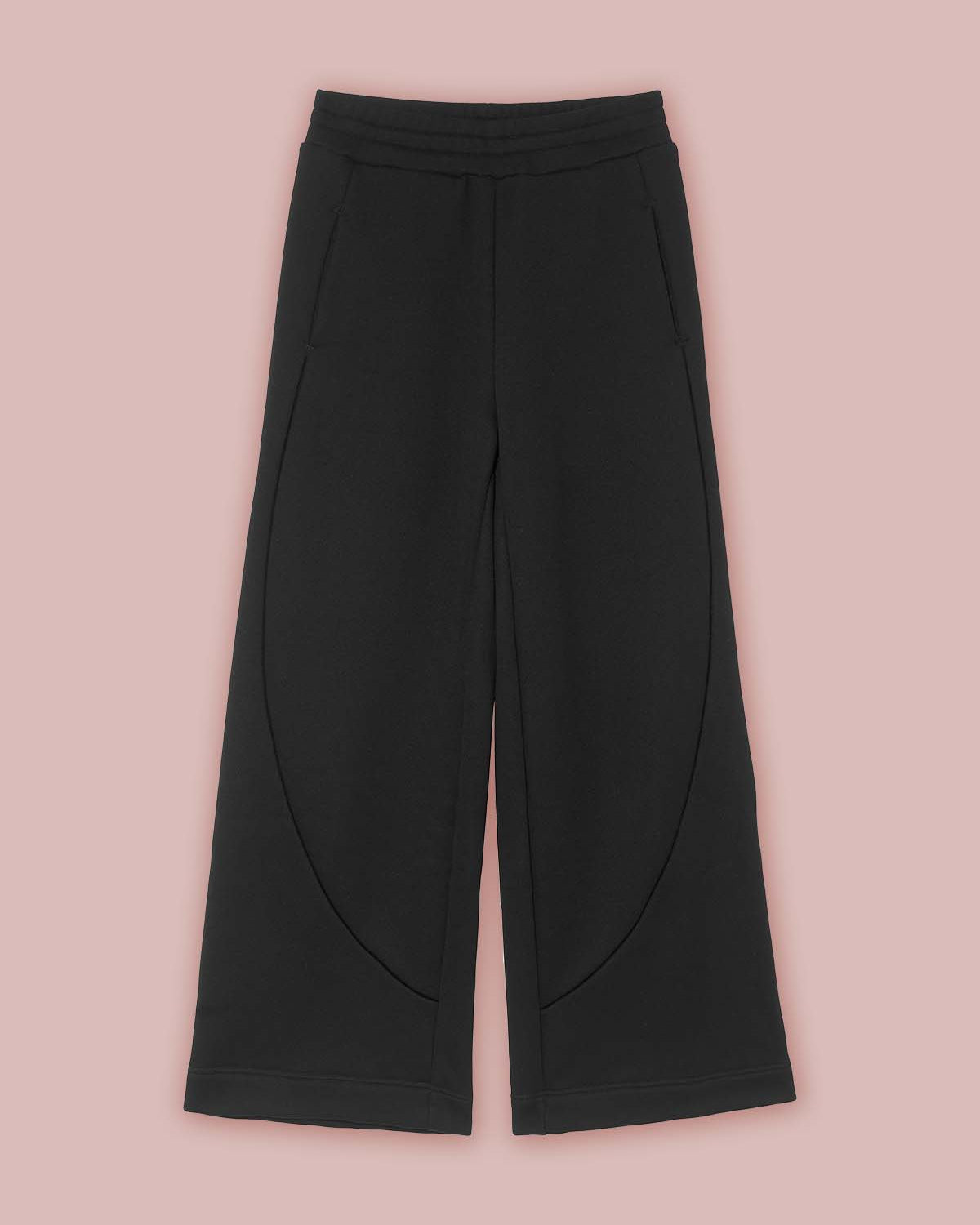 Flat view of the front of the Asmuss Column Joggers in black, showing the curved seam detailing and pockets