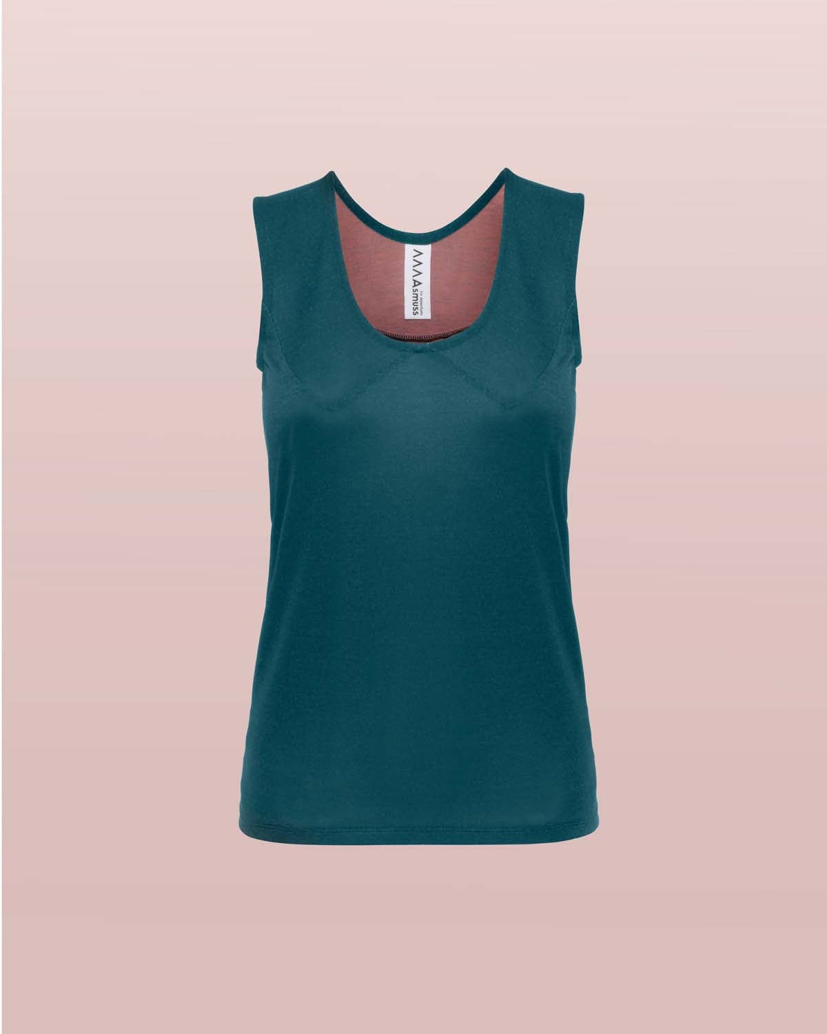 The Asmuss Panelled Tank in Pine Green made from a sustainable, recycled polyester and Tencel, luxurious feeling fabric that has extra benefits while for your everyday adventures or travel. One of the best elevated essentials.