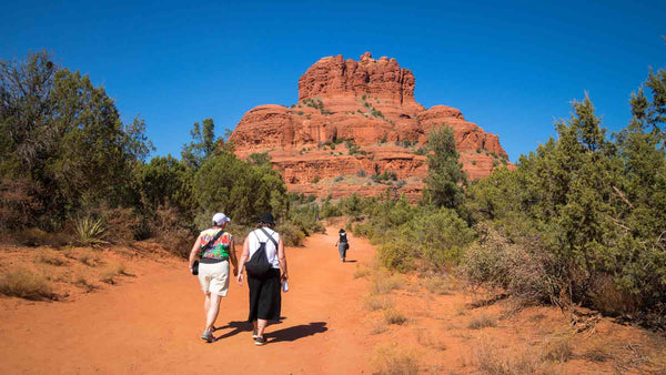 Hiking towards the Bell red rock formation in Sedona