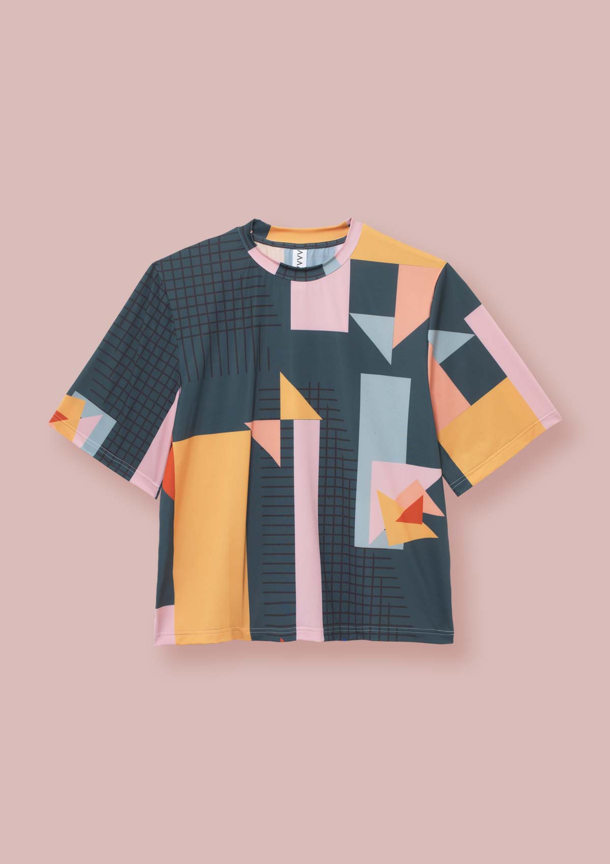 Front view of a Geometric block print t-shirt with a dark green base, pink, yellow, orange, peach, sea green and black the Asmuss Drew T-shirt