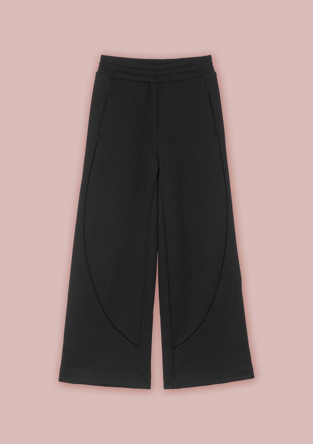 Flat view of the front of the Asmuss Column Joggers in black, showing the curved seam detailing and pockets 
